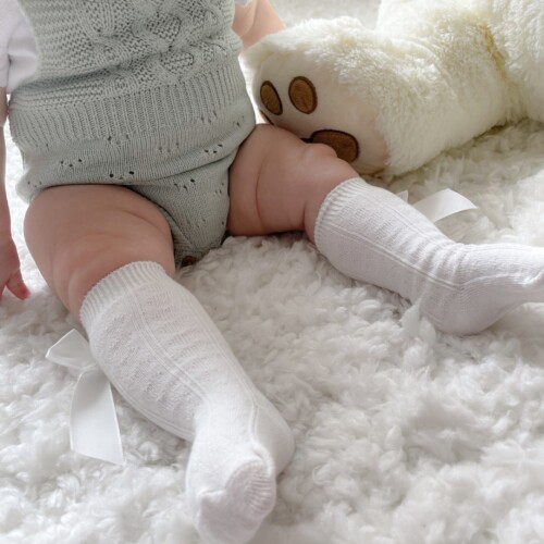 Chaussettes à genoux avec nœud pour bébé ivoire